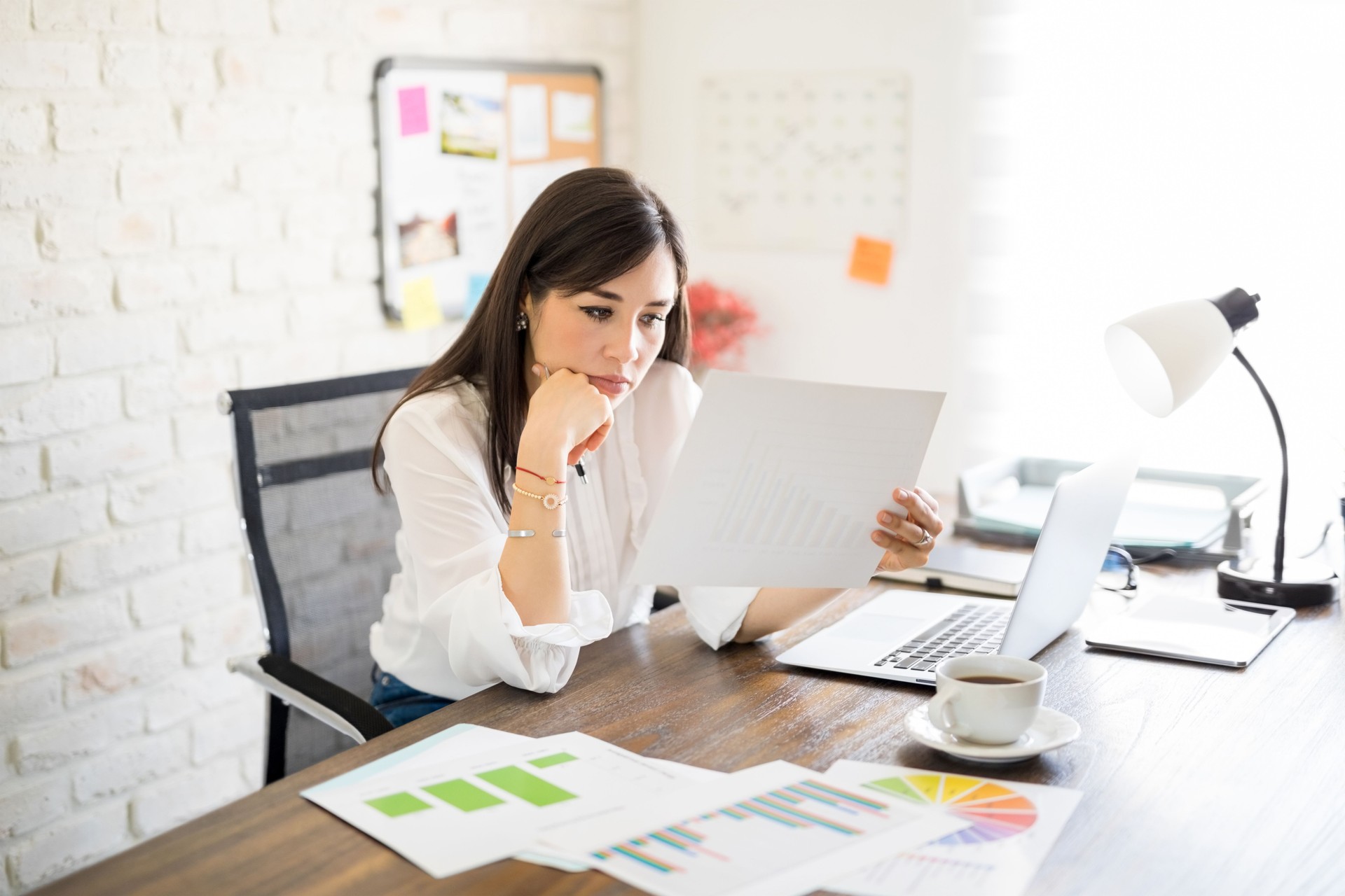 Finance manager analyzing reports